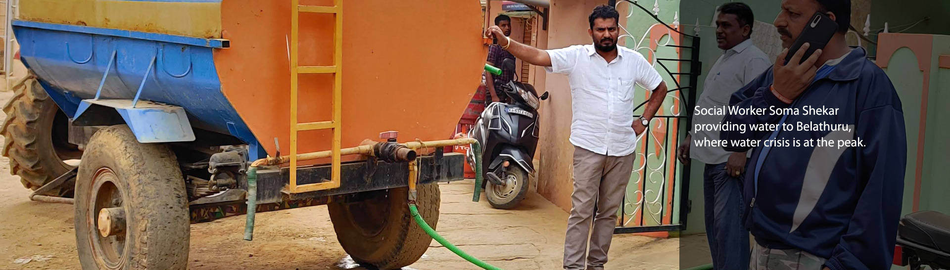 Social Worker Soma Shekar providing water to Belathuru where water crisis is at the peak